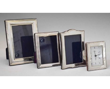 Elizabeth II silver mounted easel photograph frame, Sheffield, 2000, together with two smaller examples and silver framed des