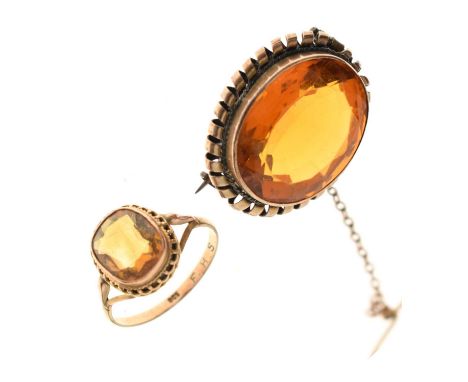 Citrine yellow metal ring, stamped '9ct', size O½, and an oval citrine-coloured stone yellow metal brooch, unmarked, 9.5g gro