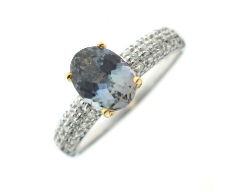 18ct white gold 'Chameleon' tanzanite and diamond ring, the oval-cut stone 8mm x 6mm approx, size N approx, 3.5g gross approx