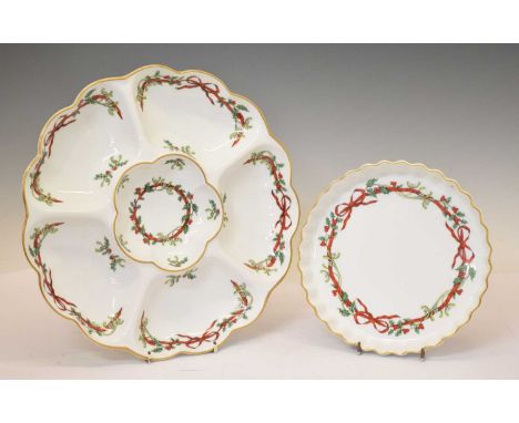 Royal Worcester hors d'oeuvres dish and flan dish, printed in the 'Holly Ribbons' pattern, printed marks, 34cm diameter and s