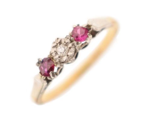 Illusion set diamond and ruby three-stone ring, stamped '18ct', size O, 2.7g gross approx
