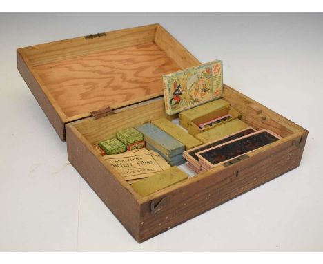 Collection of early 20th century magic lantern slides to include; 'Three Little Pigs', Mickey Mouse safety films, picture fil