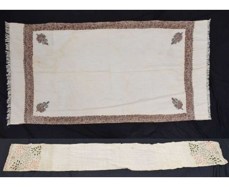 Cream woollen shawl, late 19th or early 20th century, embroidered with Paisley motifs within conforming border, 93cm x 180cm,