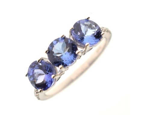 18ct white gold, three tanzanite and diamond set ring, size N approx, 3.7g gross approx, with Gems TV certificate stating Maj