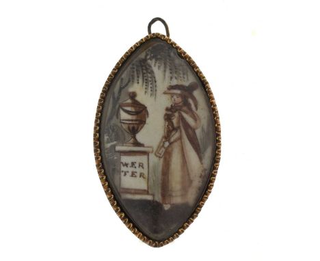 Georgian navette-shaped pendant / brooch, the glazed ceramic or white glass panel depicting a lady standing beside an urn upo