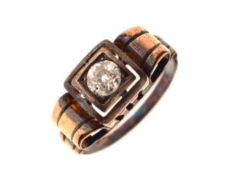 Diamond single stone ring, the diamond set within a square setting to scroll shaped shoulders, the shank stamped '585', size 