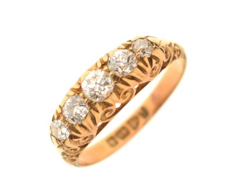 Diamond five-stone 18ct yellow gold ring, the graduated old-cut diamonds claw set in a pierced scroll mount, hallmarks for Ch
