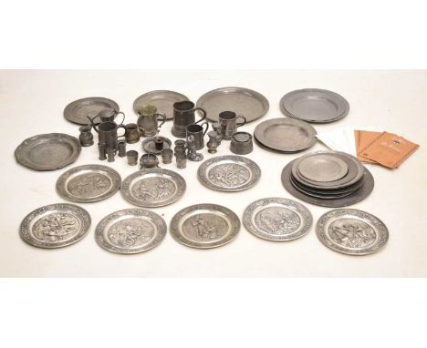 Collection of pewter 18th to 20th century, to include a Continental dish or coaster engraved with two figures, plates with 18