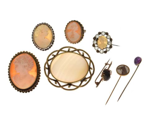 Small group of cameo brooches, together with a white agate brooch, an amethyst cabochon stick pin, a horse portrait stick pin