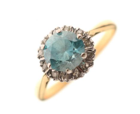 Blue topaz-coloured stone and diamond cluster 18ct gold ring, London 1980, size O½, 3.3g gross approx