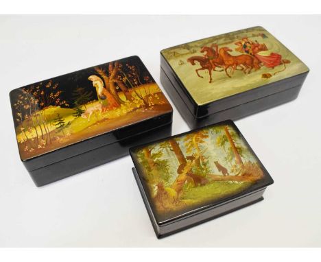 Three Russian Fedoskino lacquer boxes, circa 1980s, each of rectangular form, to include one decorated with bears in a pine f