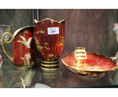 A Carltonware red lustre bowl and vase, with Chinese decoration and a similar jug depicting a flying duck