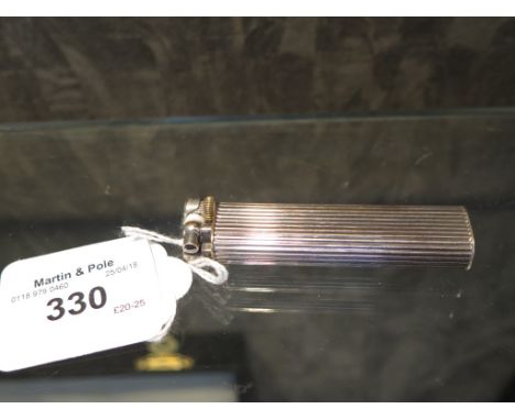 A Dunhill slim silver plated petrol pocket lighter with ribbed decoration, as found, 6.9cm high