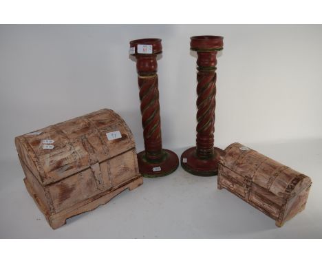 PAIR OF WOODEN CANDLESTICKS, TOGETHER WITH A WOODEN TRUNK