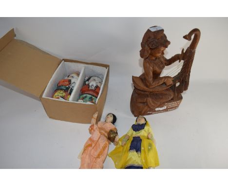 CARVED WOODEN FIGURE OF A BURMESE GIRL PLAYING A MUSICAL INSTRUMENT WITH PRESENTATION INSCRIPTION TO FRONT FROM ANAESTHETIST 