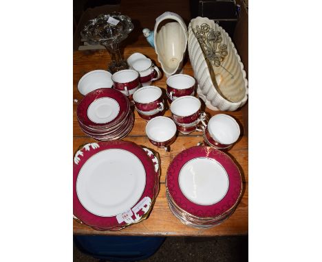 TEA SET WITH A GILT DESIGN ON PINK GROUND COMPRISING 10 CUPS, SAUCERS ETC AND SOME SMALL GLASS VASES