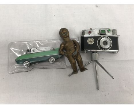 Three novelty lighters to inc Serome Bluebird, KKW camera and early nude putti