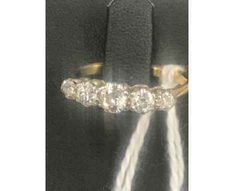 An 18ct diamond five-stone dress ring