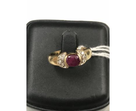 A 9ct ruby and diamond ring