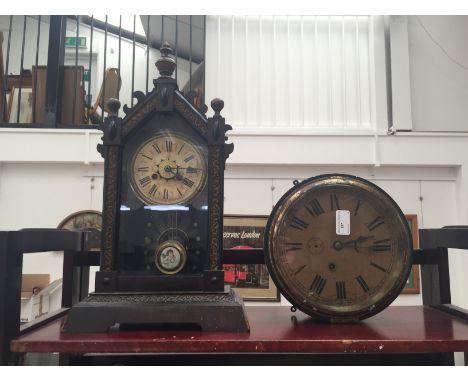 A mantel clock; together with a bulkhead clock