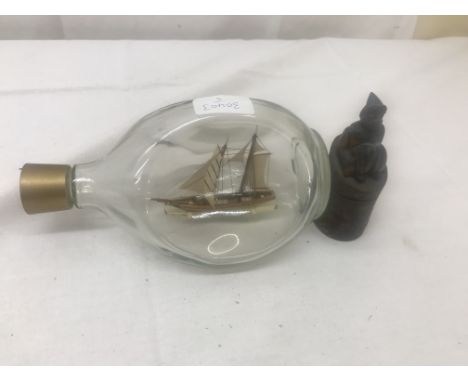 A dimple bottle and ship; together with an inkwell in the form of a clown
