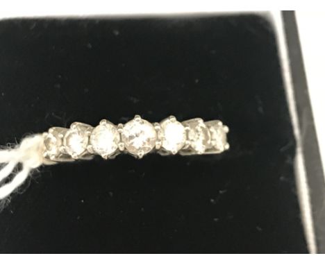 An 18ct half eternity diamond ring
