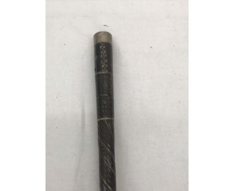 A silver inlaid officer's stick