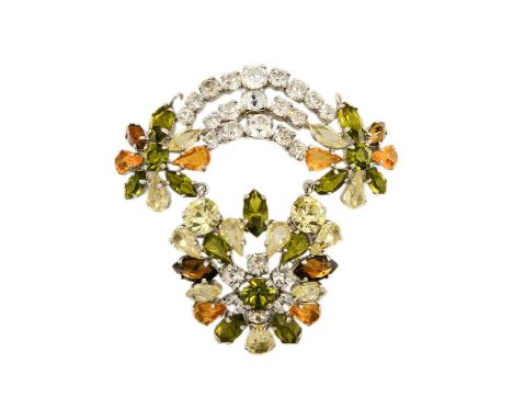 A Christian Dior 1950s paste set articulated brooch. Stamped to the back Chr. Dior 1959, width 57mm.One green marquis cut sto