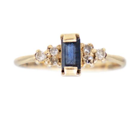 A modern 9ct sapphire and diamond set seven stone ring. London 1983, size K, 1.3g.