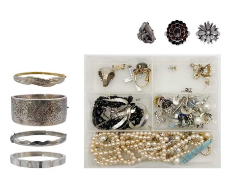A selection of costume jewellery. Including a silver hinged bangle, 45.1g, and various other items of silver and gold plated 