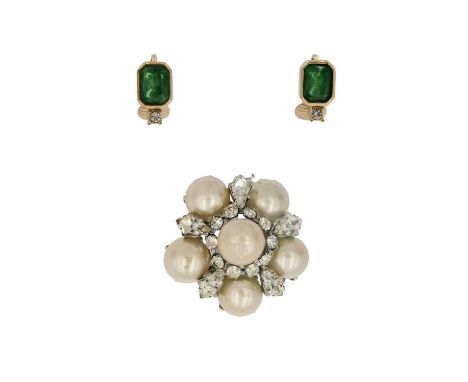 CHRISTIAN DIOR - A pair of clip earrings and a faux pearl brooch. The gold plated earrings paste set, signed Chr. Dior, lengt