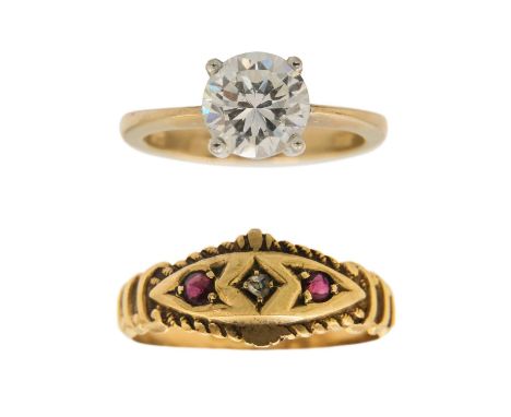 An Edwardian 18ct diamond and ruby set three stone ring and a 9ct CZ ring. The 18ct ring with three small stones, Birmingham 