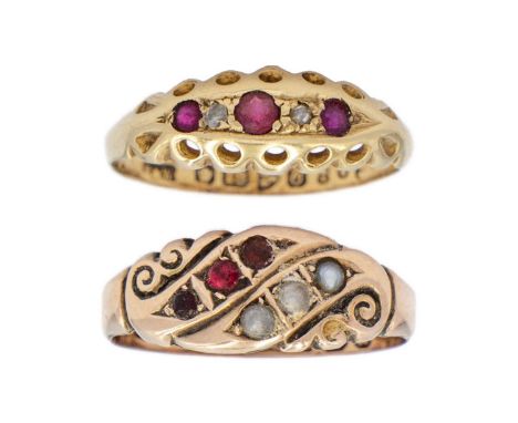 An early 20th century 1`8ct diamond and ruby five stone ring.  Set with two small diamonds, two rubies and a replacement cent