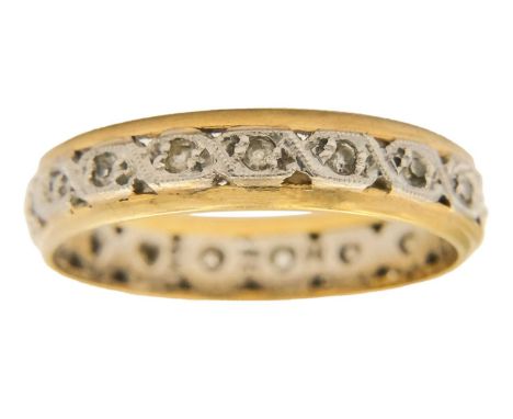 An 18ct and Palladium diamond set full eternity ring. Millegrain set with small round cut diamonds, stamped 18 PAL, size K, 1