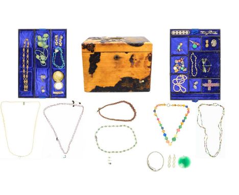 A Victorian large four tier jewellery box containing a little costume jewellery. Including a silver anchor and paddle brooch,