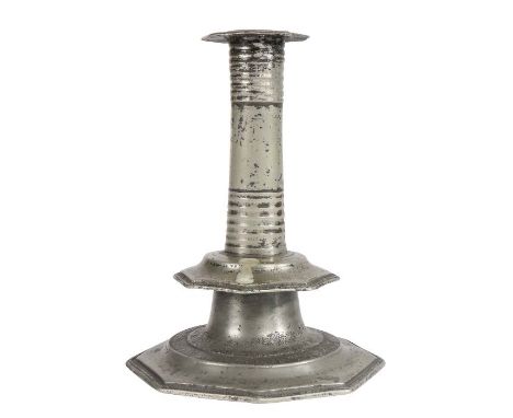 A rare Charles II pewter pillar stem and octagonal-base candlestick, circa 1685The slightly waisted stem with upper and lower