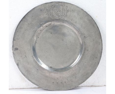 A rare Charles I pewter broad rim plate, Devon, circa 1630The rim engraved with the arms of the Edgecumbe family, set within 