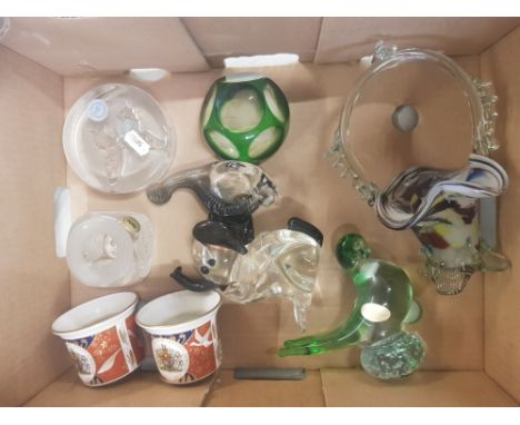 A collection of glass ware items to include italian art glass basket, goebel paperweight, spode paperweight and other paperwe