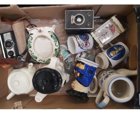 A mixed collection of ceramic items to include Masons Photo frame, 1982 World cup Mug, novelty tea pot together with Two boxe