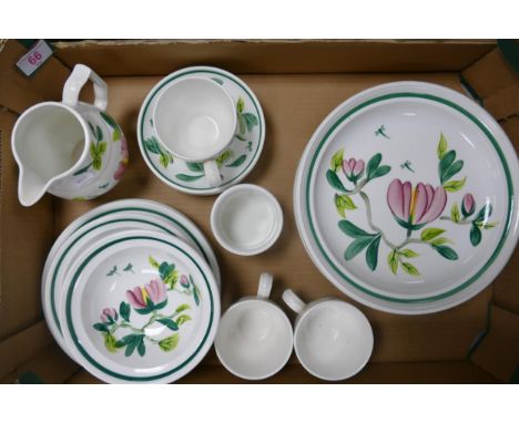 A collection of Portmerion Magnolia tea and dinner ware to include shallow bowls, cups, saucers, side plates etc 