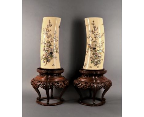 A fine pair of Japanese Shibiyama inlaid ivory tusks, last quarter of the 19th century, profusely inlaid with mother of pearl