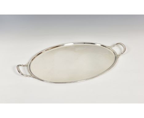 A Cardinal plate serving tray, of typical oval form with twin loop handles, 19¾in. (50.4cm.) wide. * Very light surface wear,