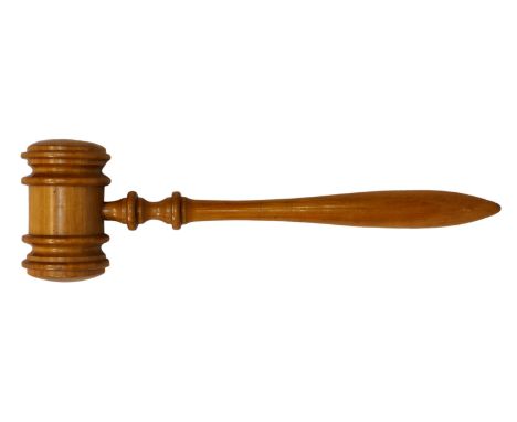 A vintage novelty oversized fruit wood gavel, of typical turned wood form, but larger, 33½ (85cm.) long. * Condition: 5.5cm. 