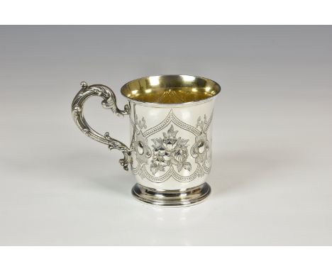 A Victorian silver christening tankard, Edward & John Barnard, London 1860, with repoussé decorated floral sprays in inverted