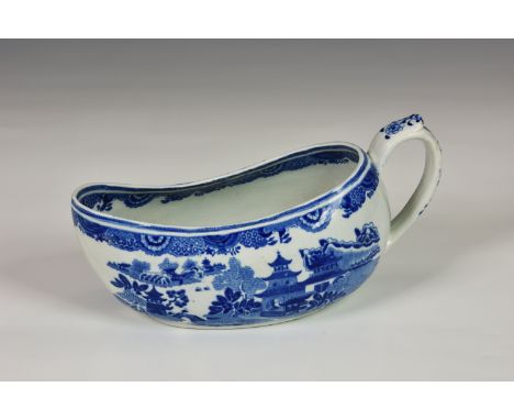 A late 18th or early 19th century Spode pearlware blue and white transfer printed Bourdalou, impressed factory mark and 'M' t