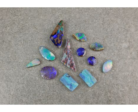 A collection of loose boulder opals, of various shapes. (12) 