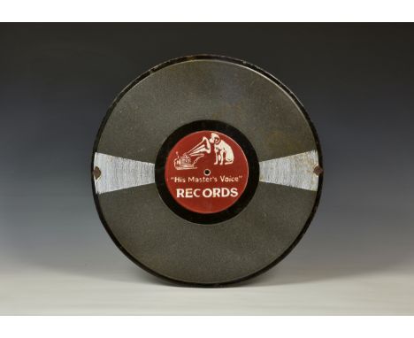 A vintage enamel "His Master's Voice" RECORDS advertising sign, in the form of a 78 shellac record, 18in. (45.8cm.) diameter.
