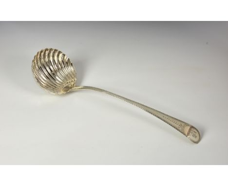 A George III silver bright cut Old English pattern soup ladle, Hester Bateman, London 1784, with bright cut feathered banding