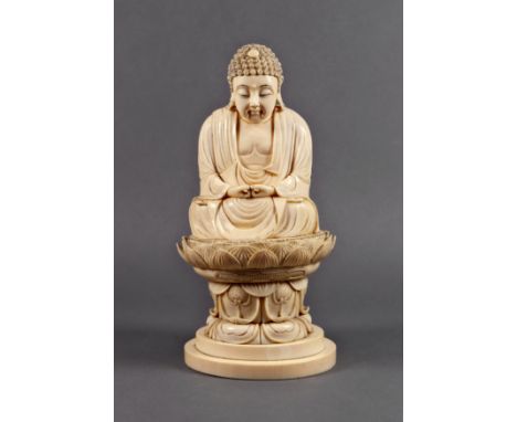 A Chinese carved ivory figure of Buddha, Qing Dynasty, sitting cross-legged in a lotus blossom above a short column of more l