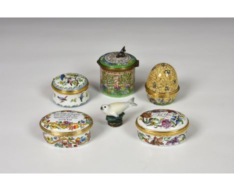 A collection of Halcyon Days and other porcelain trinket and pill boxes, comprising a boxed garden sundial trinket box; a bee
